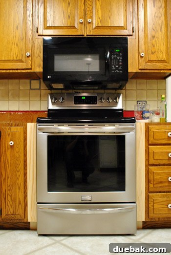 Optimize Your Kitchen: Filling Stove-Side Cabinet Gaps 14 Peninsula area with cabinets, before panel installation