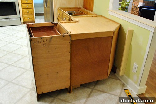 Optimize Your Kitchen: Filling Stove-Side Cabinet Gaps 15 Peninsula from dining area, showing corner piece installed