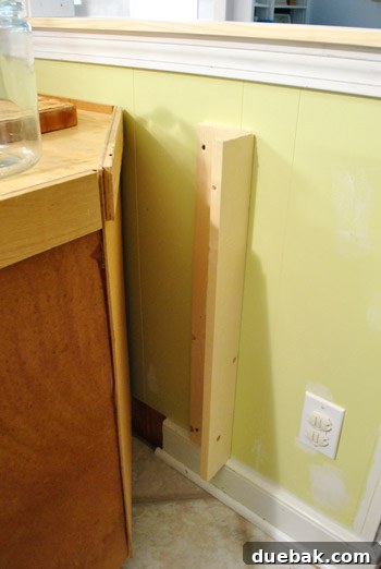 Optimize Your Kitchen: Filling Stove-Side Cabinet Gaps 16 Close-up of the corner anchor piece for the peninsula panel
