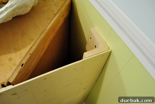 Optimize Your Kitchen: Filling Stove-Side Cabinet Gaps 19 Stools placed at peninsula, showing potential seating area