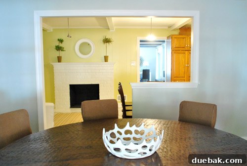 Optimize Your Kitchen: Filling Stove-Side Cabinet Gaps 26 Dining room showing new paint and temporary decor