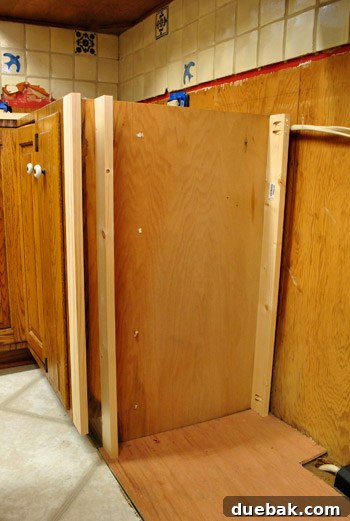 Optimize Your Kitchen: Filling Stove-Side Cabinet Gaps 6 Multiple filler pieces installed on one side of the stove