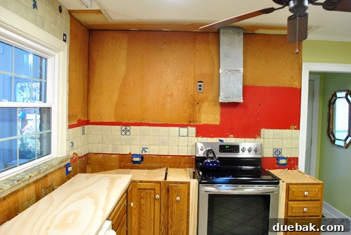 Kitchen after initial cleanup post-cabinet removal