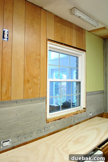 Installed wall paneling in kitchen