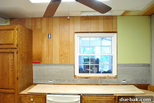 Kitchen wall with window and cement board