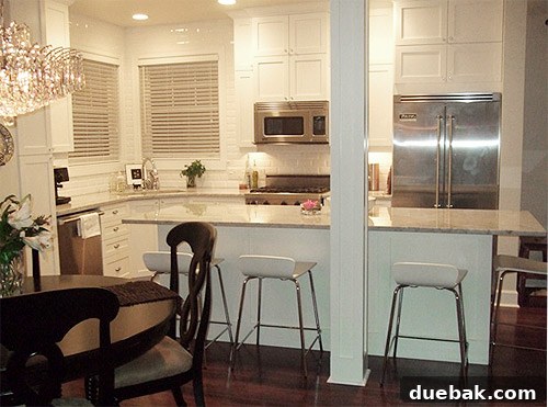 Crafting a Dream White Kitchen with Simply White Cabinetry 4 White Beveled Subway Tile Backsplash