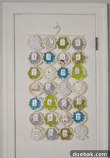 Close-up of the advent calendar with some ornaments and numbered tags visible.