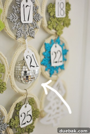 Close-up of a mini disco ball ornament on the advent calendar.