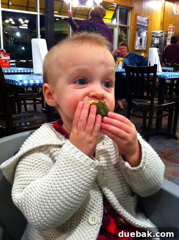 Clara eating a whole pickle