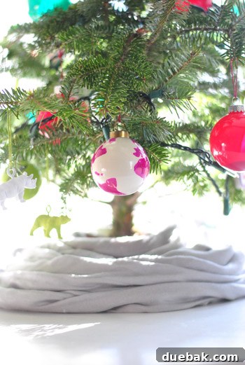 Craft Your Own Festive Christmas Ornaments 12 Another angle of the decorated mini Christmas tree, emphasizing its compact size and festive appeal.