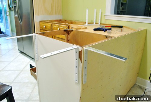 First three counter support brackets installed on kitchen peninsula
