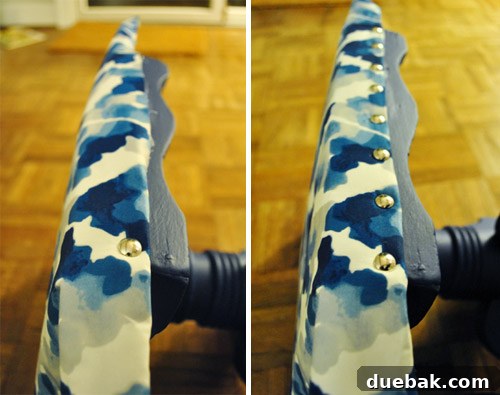 Securing fabric and batting with decorative nail heads