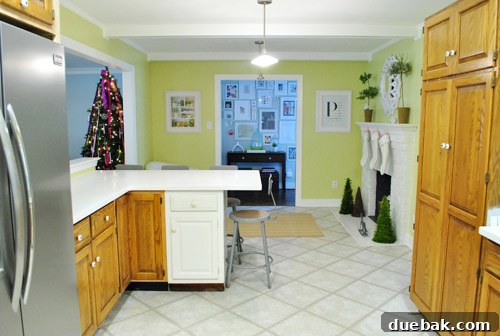 Four newly acquired industrial metal stools placed at a kitchen peninsula in an unfinished kitchen setting.