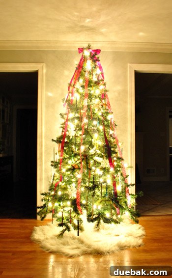 Colorful and festive Christmas tree decorated with handmade ornaments.