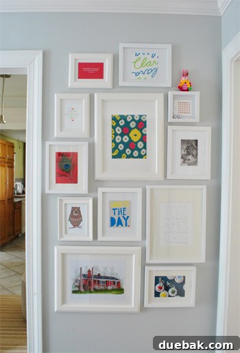 The other side of the hallway gallery wall with more holiday frame swaps.