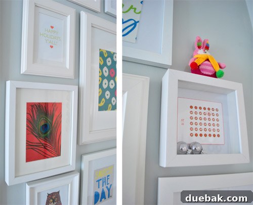 Close-up of framed 'Happy holidays, y'all!' print, peacock feather with wrapping paper, and silver ornaments in a shadow box with a bunny ornament.