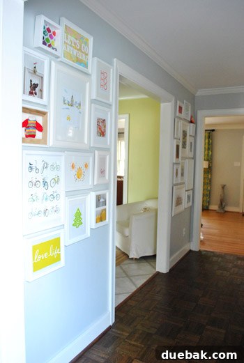 Another view of the holiday gallery wall section with six additional framed pieces.