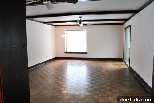 Empty hallway in our new home, showing the spacious layout.
