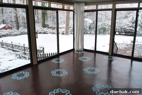Empty dining area of our first house, offering a clear view of the layout.