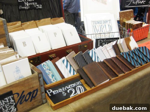 Close-up of initials on display at Almanac Industries booth