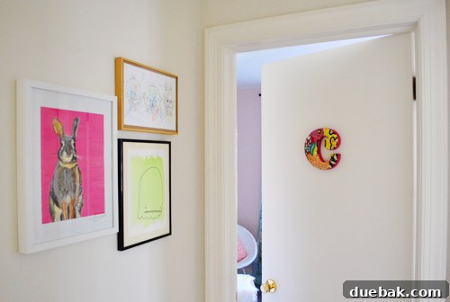 Clara's frame wall with robot and bunny prints