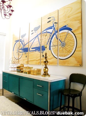 Vibrant teal metal credenza with various decorative items