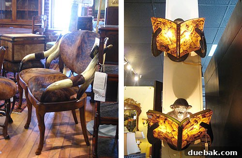 Eclectic furniture pieces including a longhorn chair and monkey sconces at Green Front Furniture