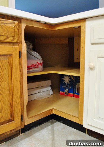 Corner cabinet with bi-fold door, showing the challenges for custom fitting.