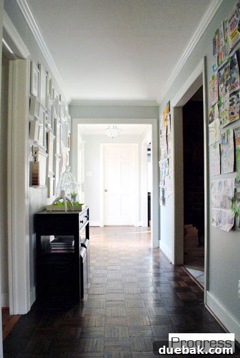 A panoramic or wide shot of a beautifully transformed room in the new house, highlighting three months of progress.