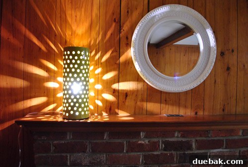A kitchen scene with modern lighting creating a dynamic atmosphere, suggesting a dance party in progress.