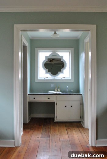 January's Standouts 14 Bedroom mirror frame painted white, creating a romantic contrast above the sink