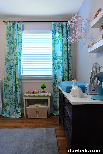 January's Standouts 17 Clara's nursery with thoughtfully hung wall decor, including a securely mounted mirror