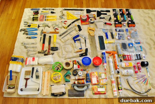 January's Standouts 19 A wide array of DIY tools and supplies meticulously laid out on a rug
