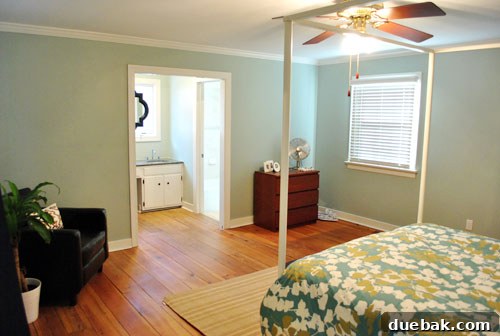 January's Standouts 10 Bedroom painted in a soft blue-gray-green color, showing a calming ambiance