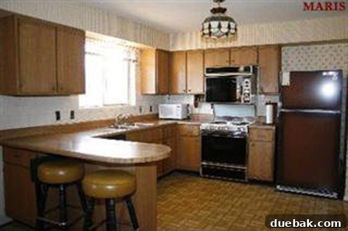 Dark and dated kitchen before renovation