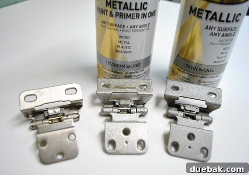 Comparison of new and spray-painted old cabinet hinges