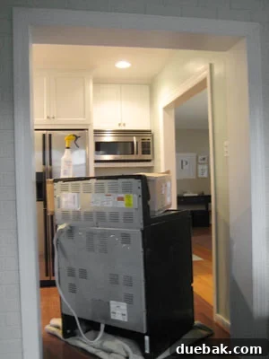 Stovepipe Whispers 3 Kitchen stove temporarily moved into a doorway during countertop installation