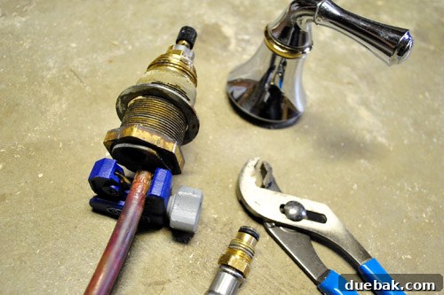 Faucet and handle components after modifications for play kitchen