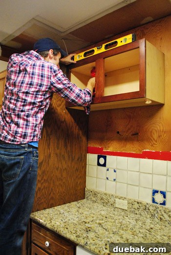 Unused kitchen cabinet before transformation into a play kitchen