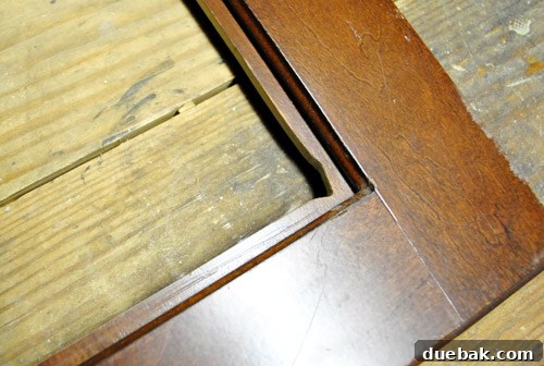 Close-up of imperfect cut for play kitchen oven window