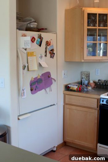 Detail of the dysfunctional cabinet and drawer setup in the old kitchen