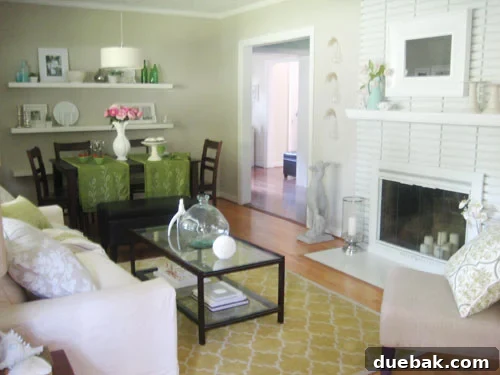 livingroomdiymagazinephotoshoot Living room transformed with spring decor, including a yellow rug and fresh flowers