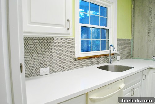 Close-up of newly installed penny tile backsplash