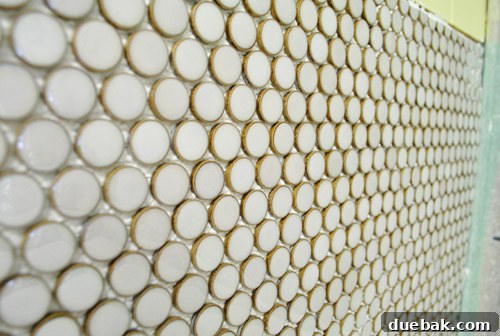 Satisfying view of well-aligned penny tile backsplash