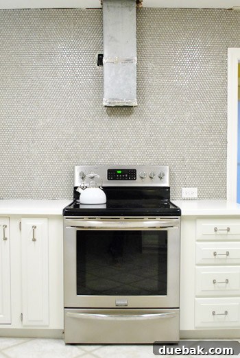 Finished penny tile backsplash, awaiting the grouting process