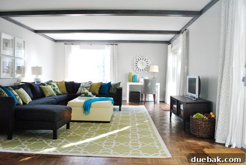 Repurposing Curtain Panels 11 Wide shot of living room with newly hemmed layered curtains, enhancing the room's aesthetic.