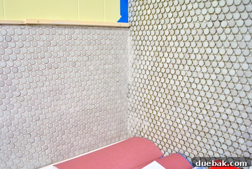Comparison of ungrouted (right) and grouted (left) penny tiles, highlighting the color change and unified look after drying.