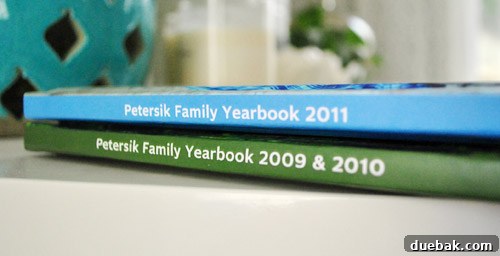 Two family yearbooks stacked, symbolizing a growing collection of preserved memories