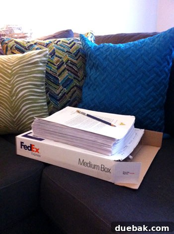 Image of a thick book manuscript delivered via FedEx, symbolizing a major achievement