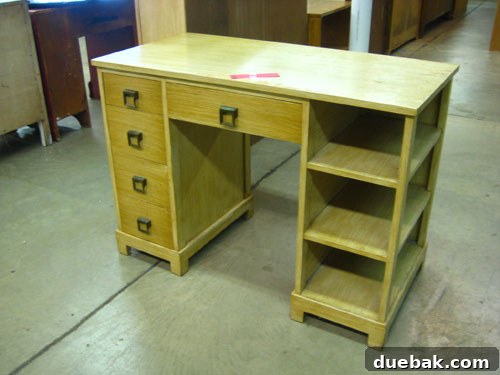 Olivia's thrift store desk before paint, showing its original condition